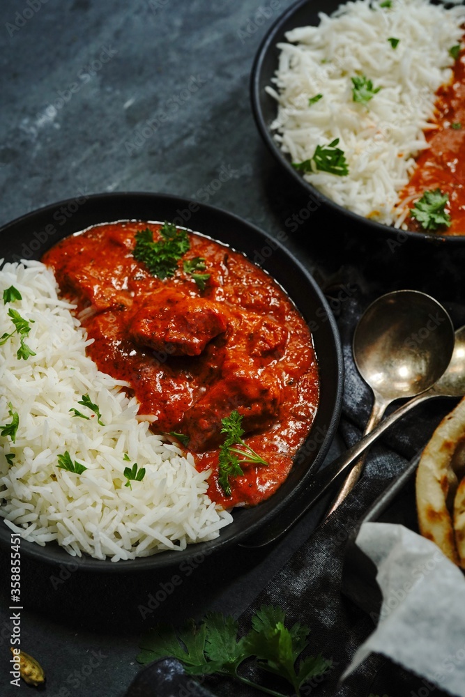 Creamy Butter Chicken/Murgh Makhani served with Roti and Basmati rice Creamy Butter Chicken/Murgh Makhani served with Roti and Basmati rice