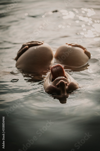 Woman swimming in lake