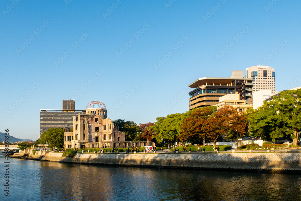Hiroshima landscape with the view of The Hiroshima Peace Memorial (Atomic Bomb Dome) and Motoyasu River  sunset in Hiroshima, Japan.