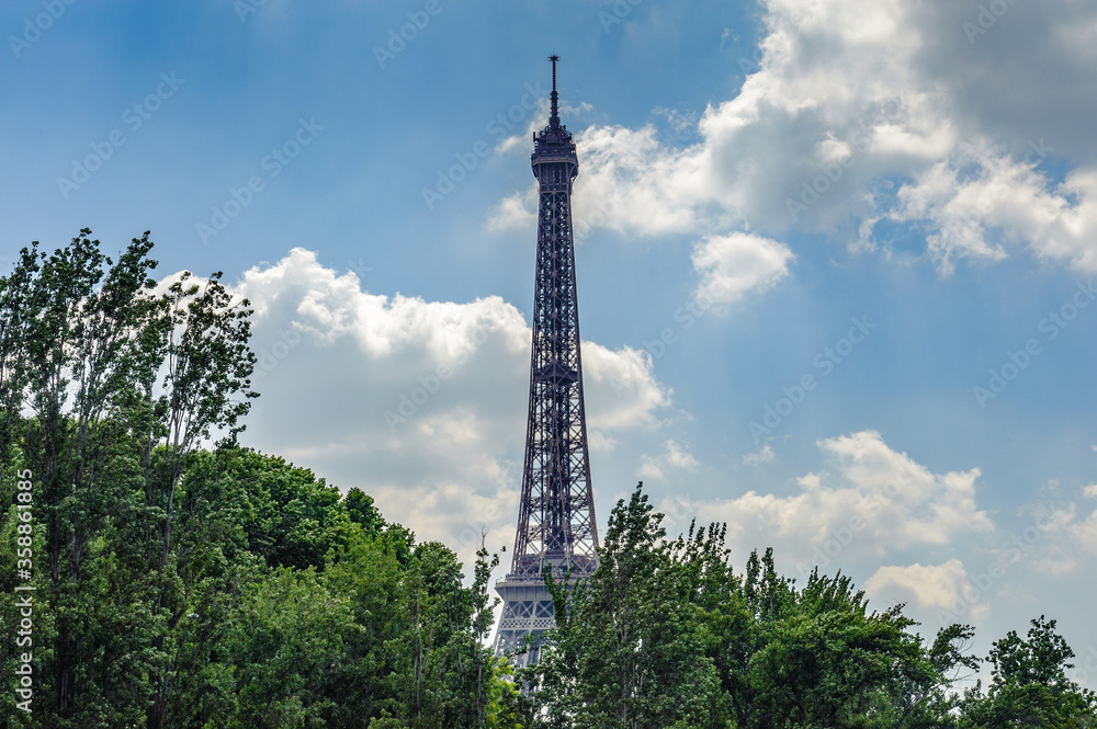 It's The Eiffel tower over the trees