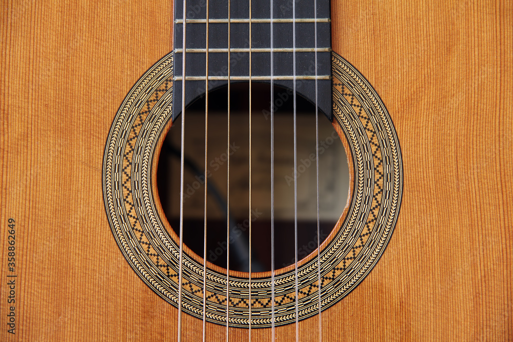 detail of the soundhole and mosaic of the 7-string guitar detail of the soundhole and mosaic of the 7-string guitar