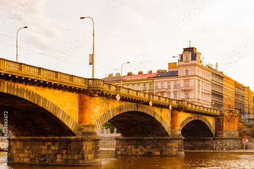 Bridge over the river Vltava in Prague in the evening