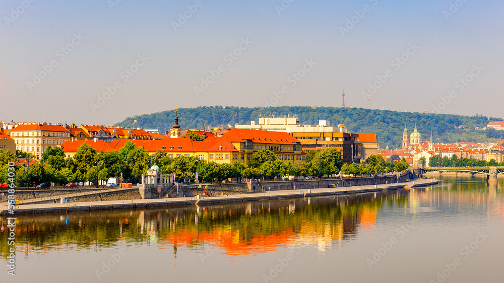 Beautiful cityscape of Prague city, Czech Republic (reflection in the river Vltava)