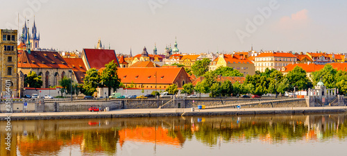 Beautiful cityscape of Prague city, Czech Republic (reflection in the river Vltava)