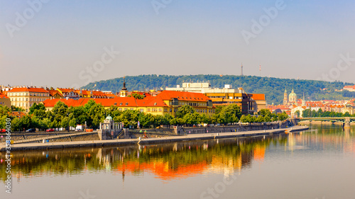 Beautiful cityscape of Prague city, Czech Republic (reflection in the river Vltava)