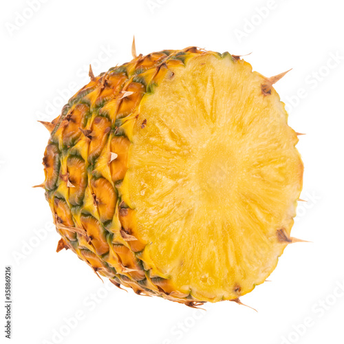 single fresh half of pineapple isolated on white background