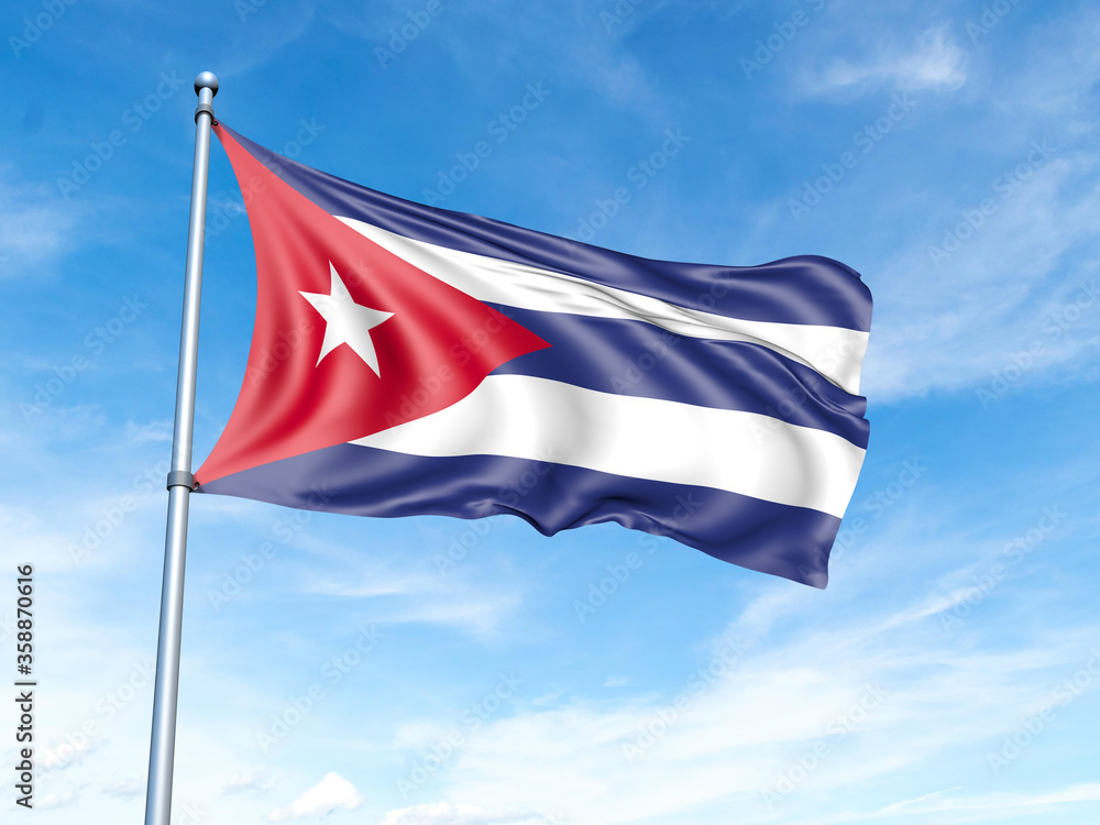 Cuba flag on a pole against a blue sky background.