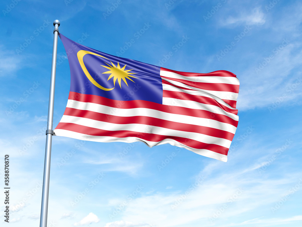 Obraz premium Malaysia flag on a pole against a blue sky background.