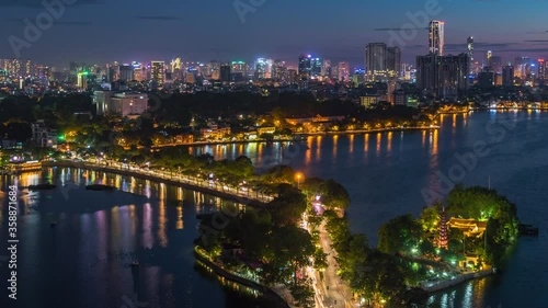 Wallpaper Mural Hanoi, Vietnam, timelapse view of Hanoi skyline at dusk showing West Lake and Tay Ho District. Torontodigital.ca