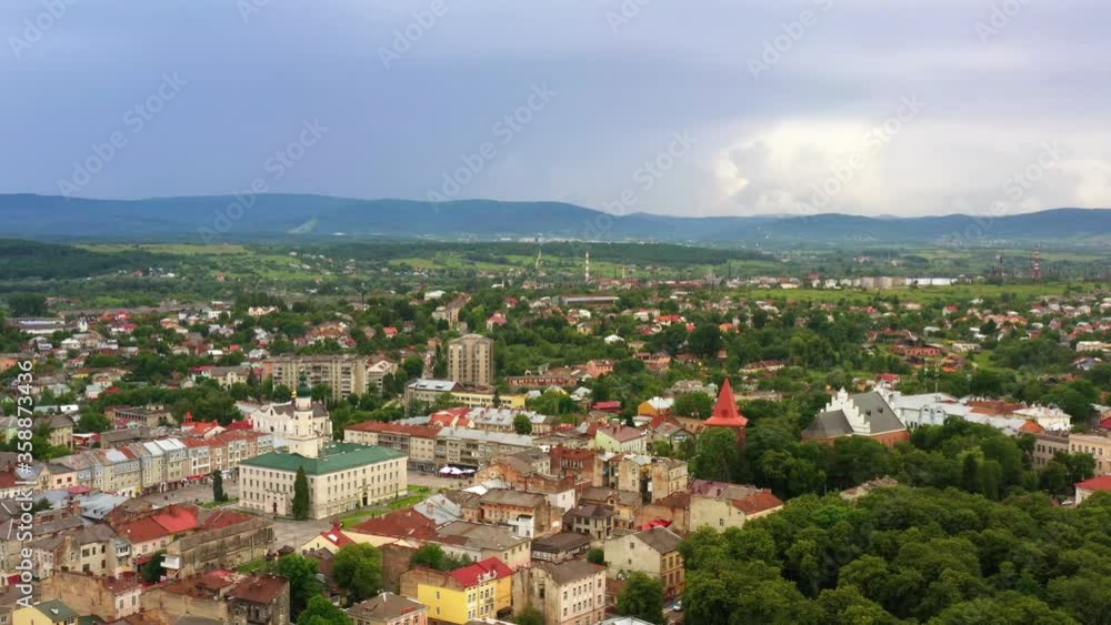 Aerial drone view of old European city - Drohobych. Downtown with city hall at center square. Cityscape
Aerial drone view of old European city - Drohobych. Downtown with city hall at center square. Cityscape