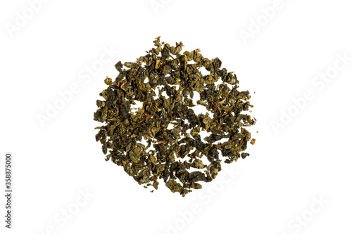 dried leaves of chinese oolong teguanyin tea isolated on a white background. tea shop concept. tea ceremony concept. top view.