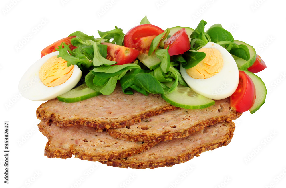 Thin slices of haslet meat with a fresh egg salad meal isolated on a white background, haslet is an English pork and herb meatloaf also sometimes called acelet Thin slices of haslet meat with a fresh egg salad meal isolated on a white background, haslet is an English pork and herb meatloaf also sometimes called acelet