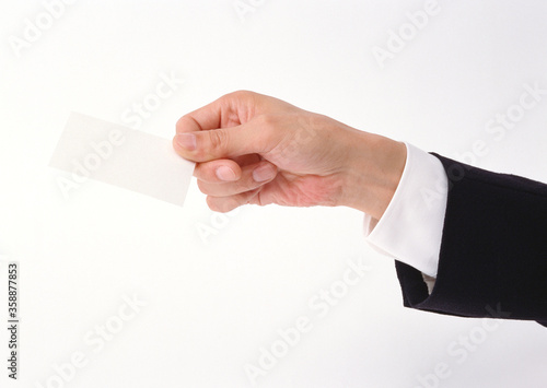 businessman holding a blank business card