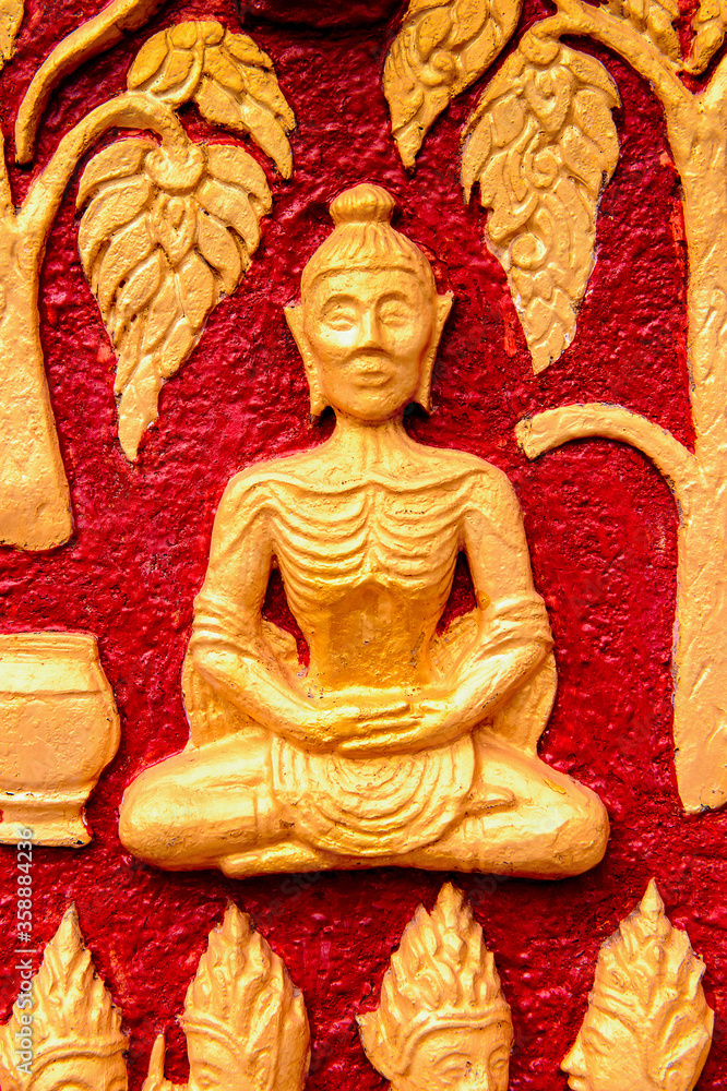 It's Drawings on the Vat Xienhgtong temple, one of the Buddha complexes in Luang Prabang which is the UNESCO World Heritage city It's Drawings on the Vat Xienhgtong temple, one of the Buddha complexes in Luang Prabang which is the UNESCO World Heritage city