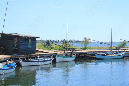 Traditional wooden boats at Bouzigues  a beautiful fishing village in the Bassin de Thau  Herault  France 