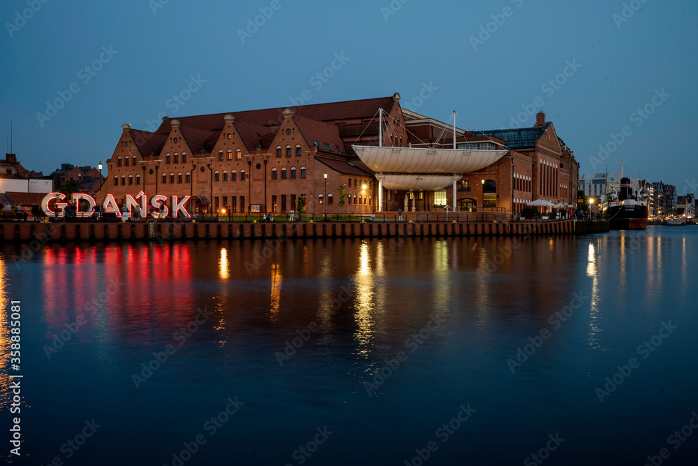 Gdansk at sunset. View of the river and concert hall