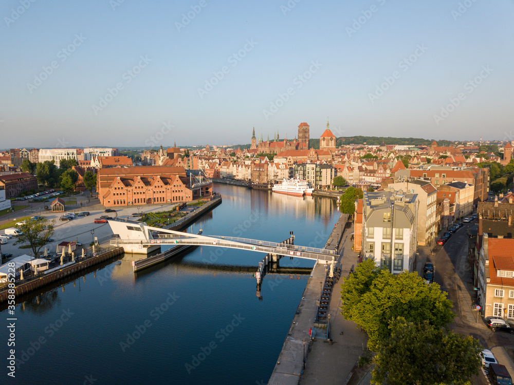 View of the footbridge and the canal in Gdansk View of the footbridge and the canal in Gdansk