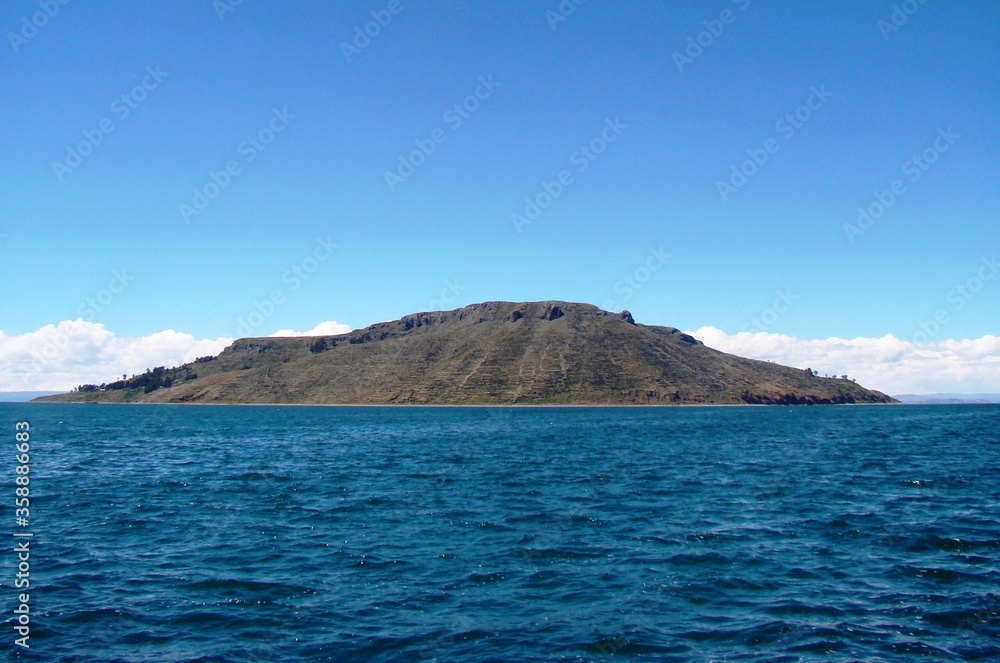 View on Taquile Island from a boat on lake titicaca (Peru) View on Taquile Island from a boat on lake titicaca (Peru)