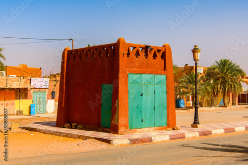 Red architecture of Timimoun, Adrar Province, south-central Algeria photo