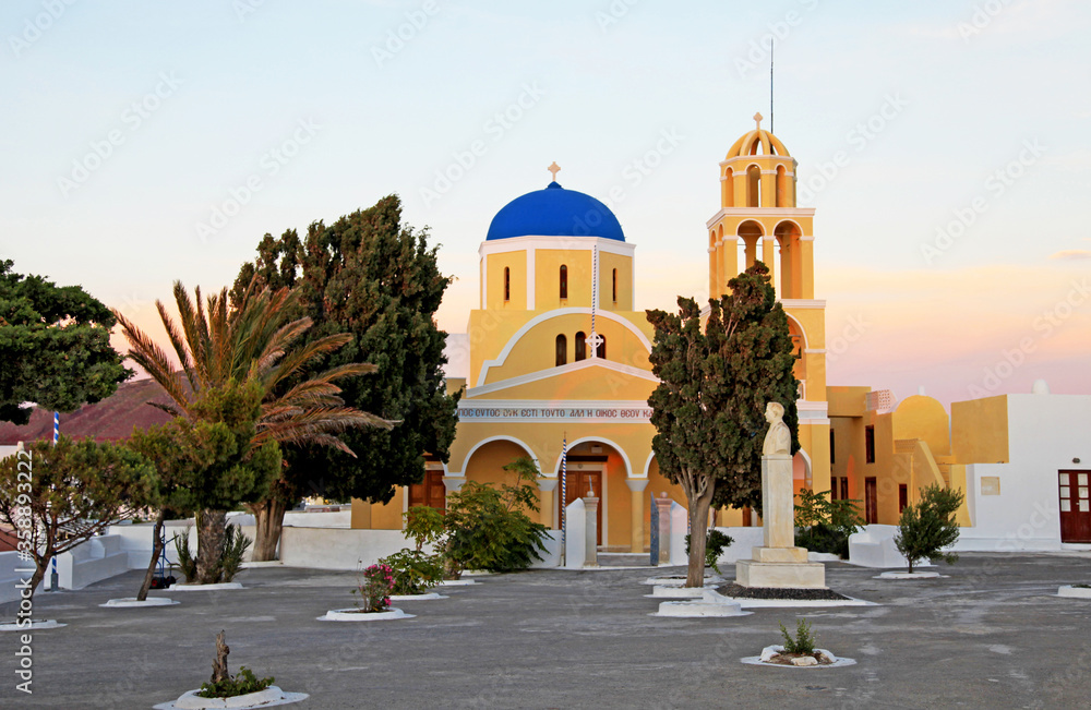 A blue-domed church in Oia, Santorini, Greece.