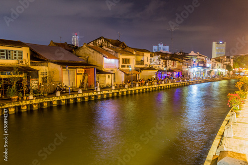 MALACCA, MALAYASIA - MARCH 18, 2018: Night view of Malacca river in the center of Malacca (Melaka).