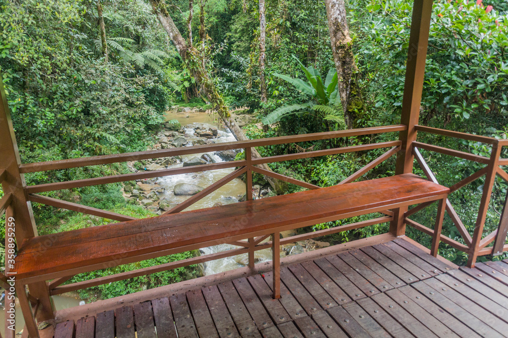 View of a small creek near Taman Rata town in the Cameron Highlands, Malaysia View of a small creek near Taman Rata town in the Cameron Highlands, Malaysia