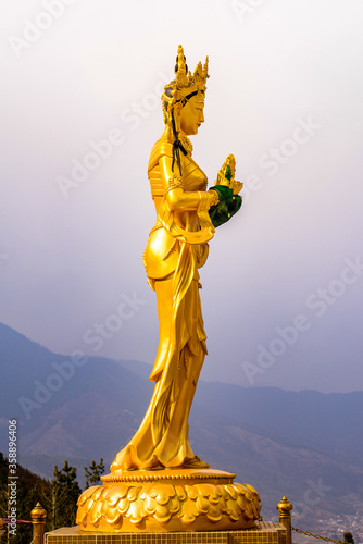 Golden statue around the Big Buddha statue in the Kingdom of Bhutan