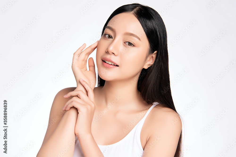 Beautiful Young asian Woman touching her clean face with fresh Healthy Skin, isolated on white background, Beauty Cosmetics and Facial treatment Concept Beautiful Young asian Woman touching her clean face with fresh Healthy Skin, isolated on white background, Beauty Cosmetics and Facial treatment Concept