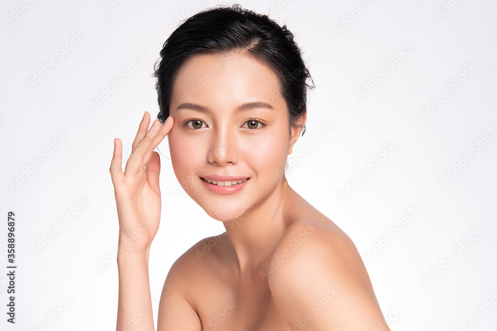 Beautiful Young asian Woman touching her clean face with fresh Healthy Skin, isolated on white background, Beauty Cosmetics and Facial treatment Concept