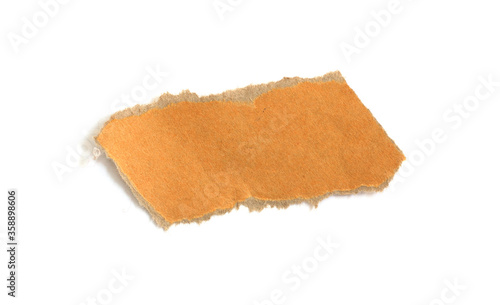piece of torn brown paper on white background with place for text