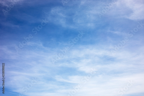 Fototapeta Naklejka Na Ścianę i Meble -  Fantastic soft white clouds against blue sky and copy space.