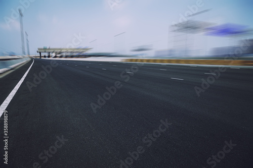empty race track road with skyline © PRASERT