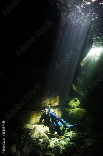 Photos A Female Scuba Diver Basks in the Sunlight at Heber River on Vancouver Island in