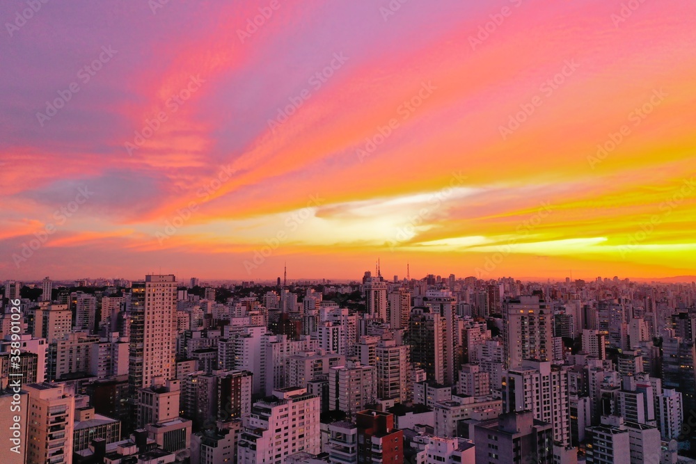 Fototapeta premium Great cityscape. Sunset view in the urban city. Colored skyline view. Great cityscape. Sunset view in the urban city. Colored skyline. Great cityscape. Sunset view in the urban city. Colored skyline.