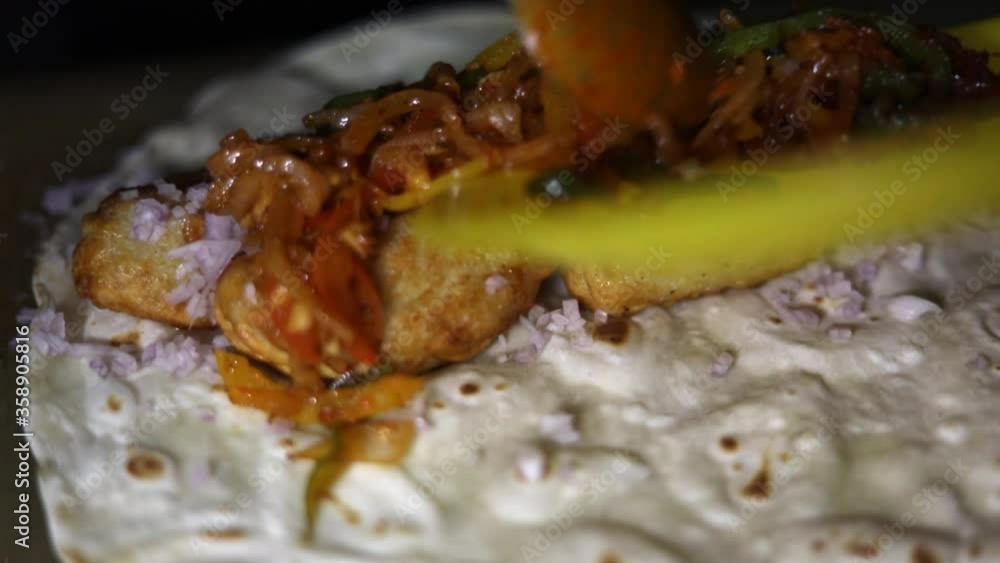Frankie, Indian kathi roll stuffed with momos. Frankie, Indian kathi roll stuffed with momos.