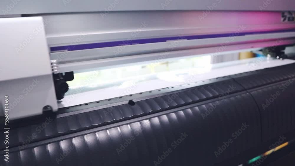 Sticker cutting machine is working. Sticker cutting machine is working.
