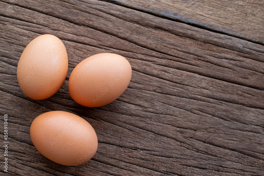 Chicken Eggs on wooden background. easter Chicken Eggs on wooden background. easter