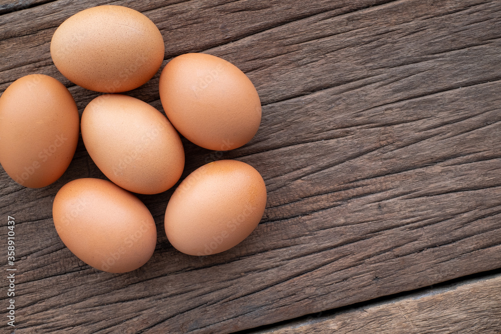 Chicken Eggs on wooden background. easter Chicken Eggs on wooden background. easter