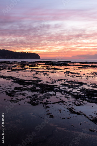 Colourful sunrise at a beach 