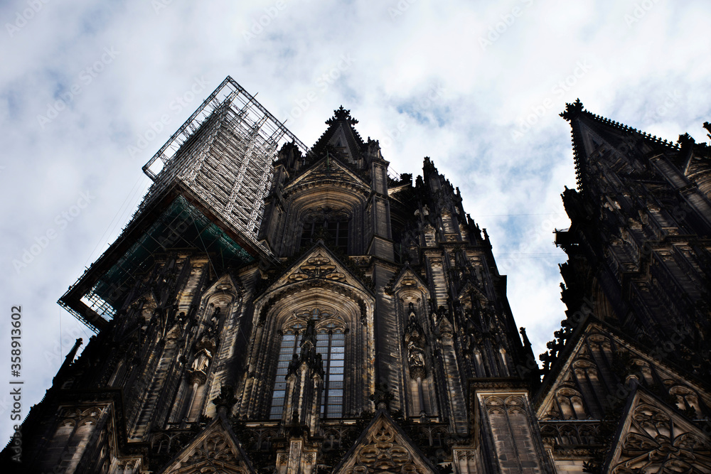 Cologne Cathedral or Hohe Domkirche St. Petrus und Maria or Kolner Dom Church German people and foreign travelers travel visit and respect praying god in Cologne, Germany