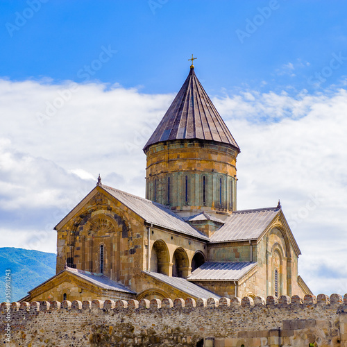 It's Svetitskhoveli Cathedral (Living Pillar Cathedral), a Georgian Orthodox cathedral located in the historical town of Mtskheta, Georgia. UNESCO World Heritage photo