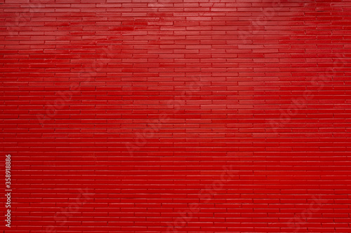Red brick wall and grout finish. Texture for backgrounds.
