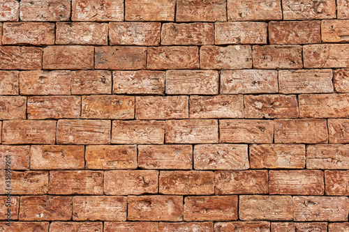 Obraz na plátně Exposed brick wall or wall, with apparent mortar