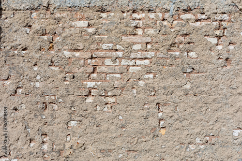 Obraz na plátně Exposed brick wall or wall, with apparent mortar
