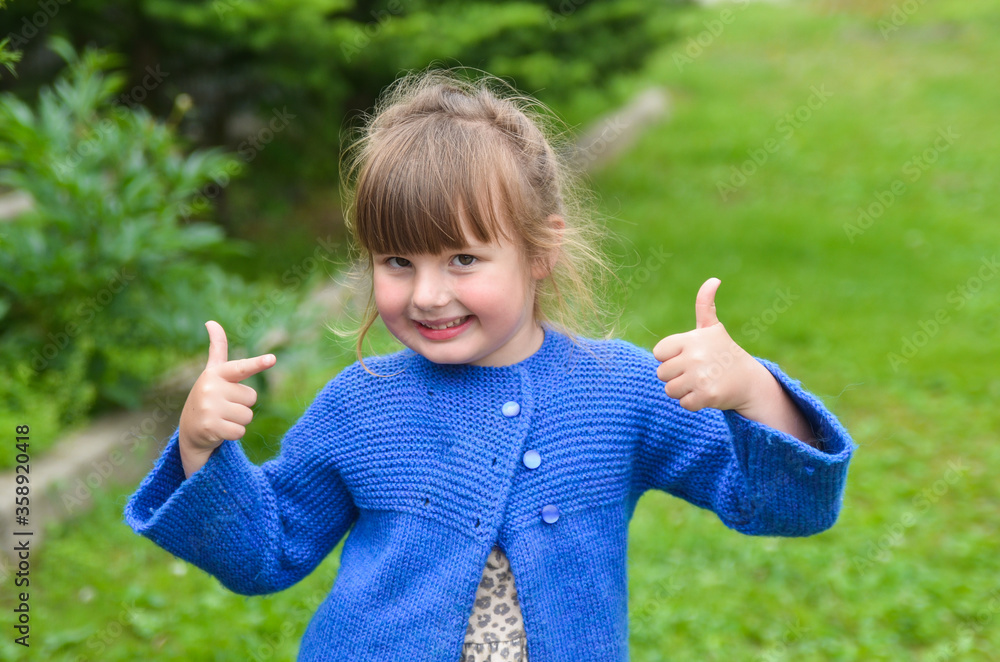 Happy happy child in the park summer lifestyle. People's emotions Happy happy child in the park summer lifestyle. People's emotions