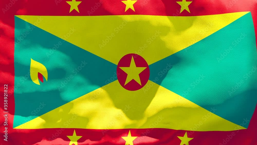 The national flag of Grenada flutters in the wind The national flag of Grenada flutters in the wind