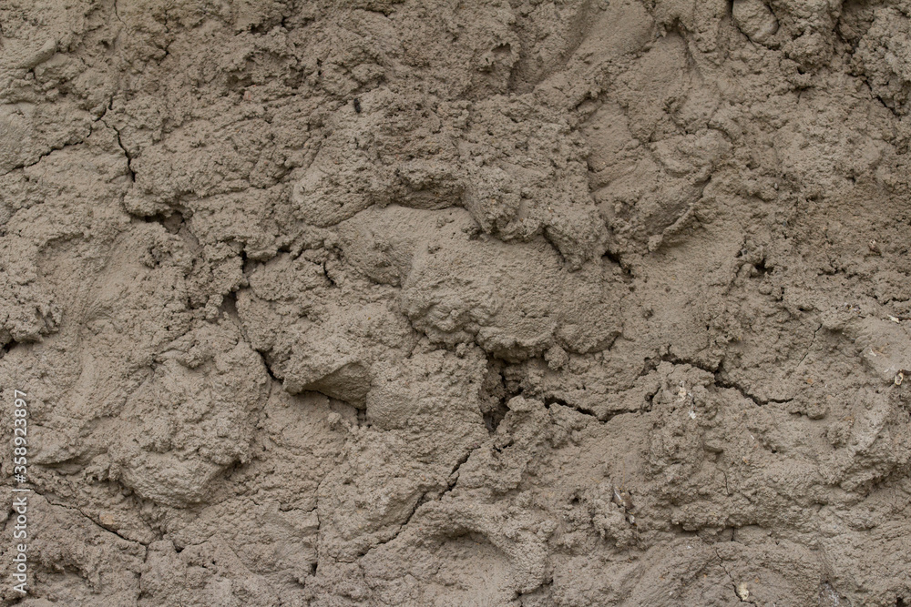  A rough concrete wall covered with cement