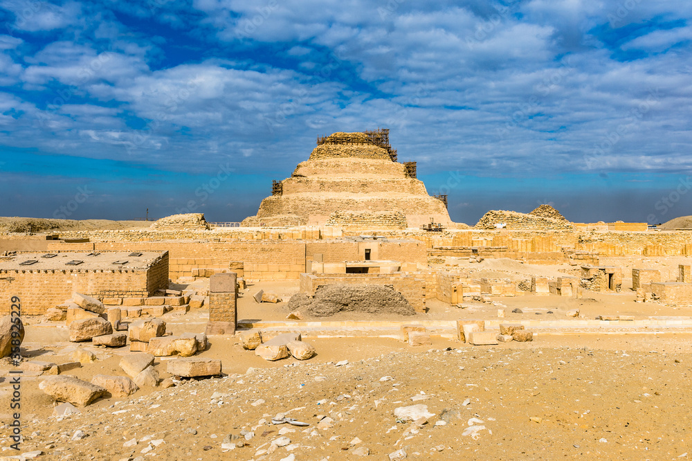 It's Pyramid of Djoser (Stepped pyramid), an archeological remain in the Saqqara necropolis, Egypt. UNESCO World Heritage
