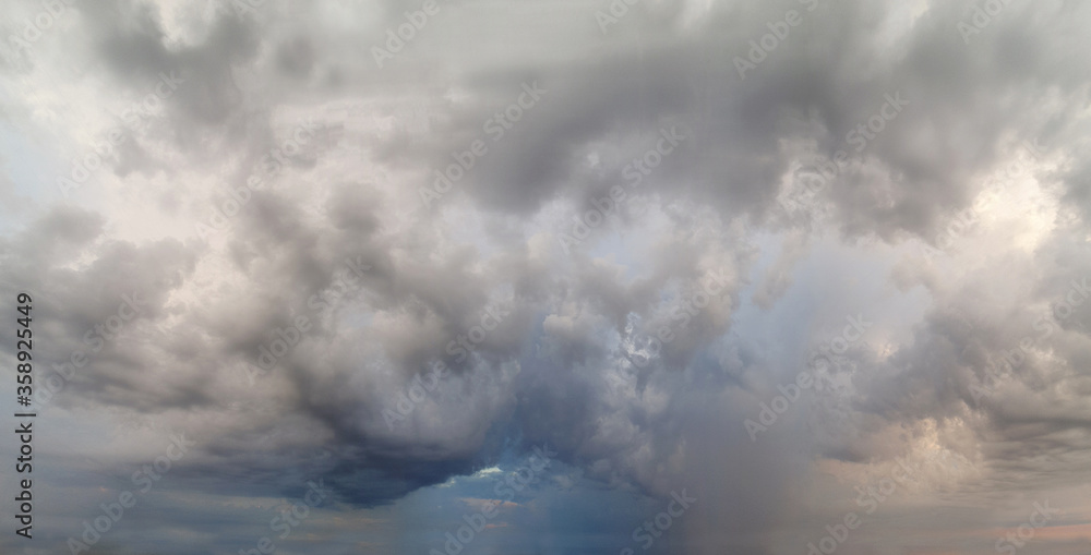 Dark stormy clouds in the sky. Cloudscape. Dark stormy clouds in the sky. Cloudscape.
