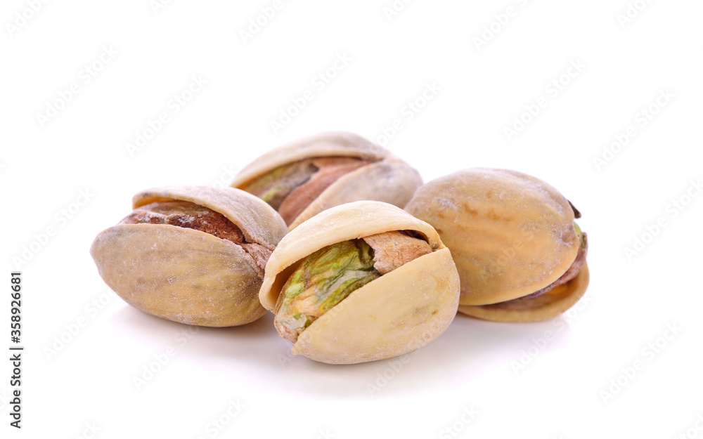 Pistachios In Shell Roasted isolated on white background Pistachios In Shell Roasted isolated on white background
